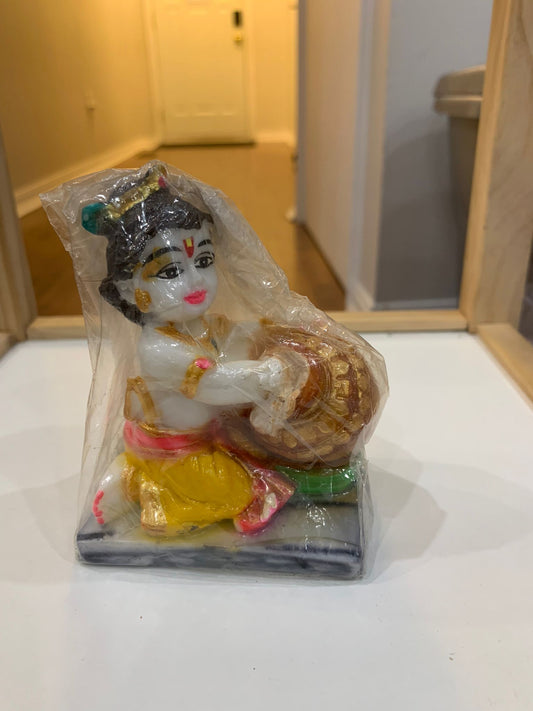 Krishna eating macan(Sitting) - Small