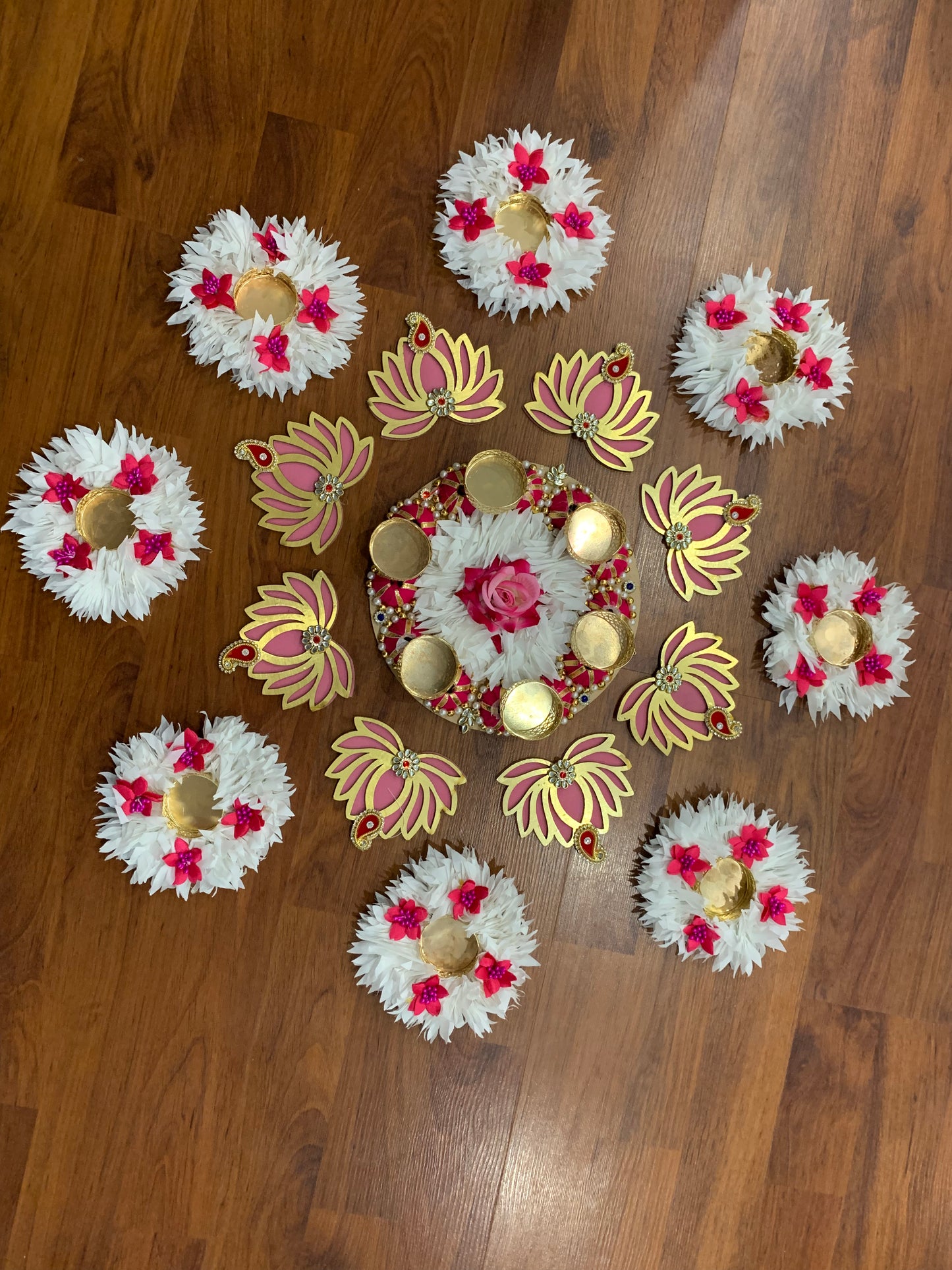 Artificial flower rangoli with Lotus and Candle holder